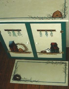 Birdhouse Nests and Beehives on Cabinet - Chris Barrett